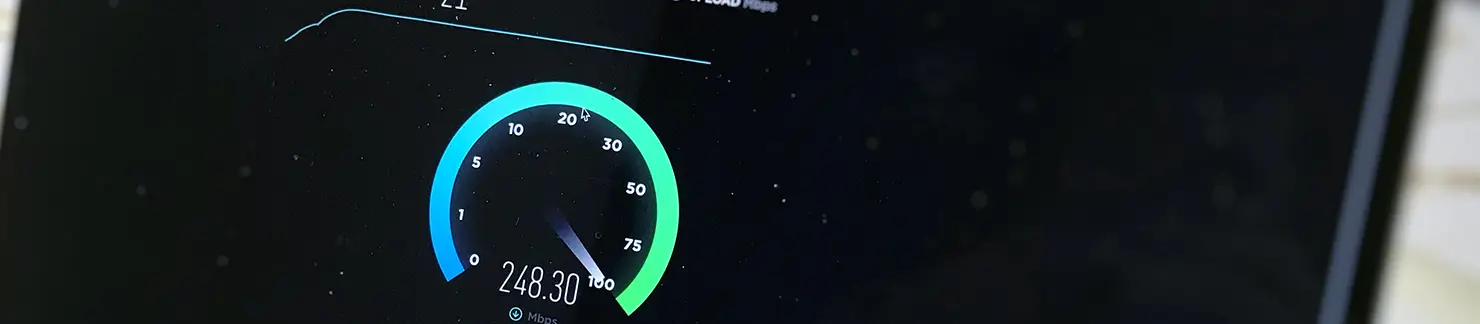 Internet speed test gauge on a tablet screen